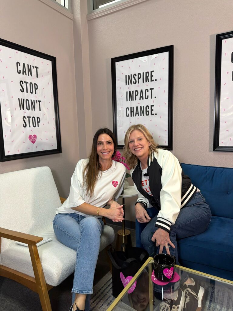 Image of Brooke Neubauer and Anna Schmid sitting for The Just One Podcast.