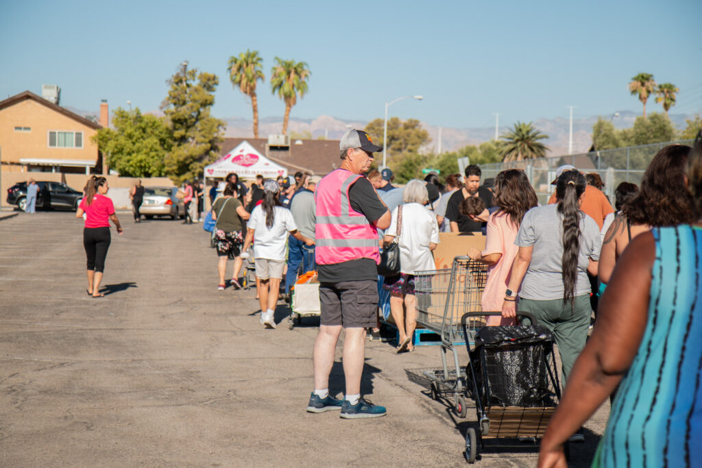 Southern Nevada community members attend a food distribution hosted by The Just One Project.